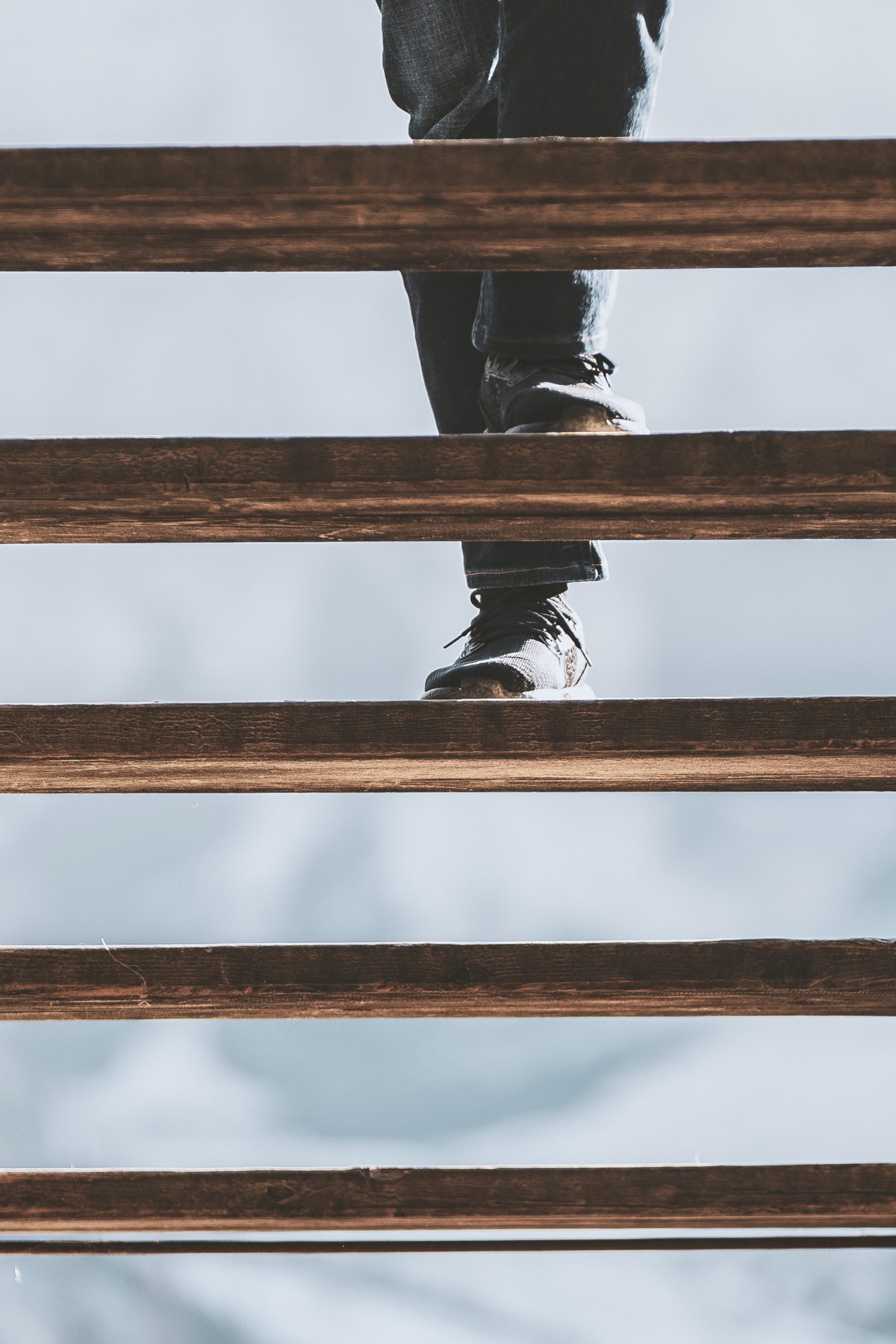 Closeup of feet climbing stairs